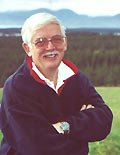 Joe Cuthbertson overlooks his own olive grove.